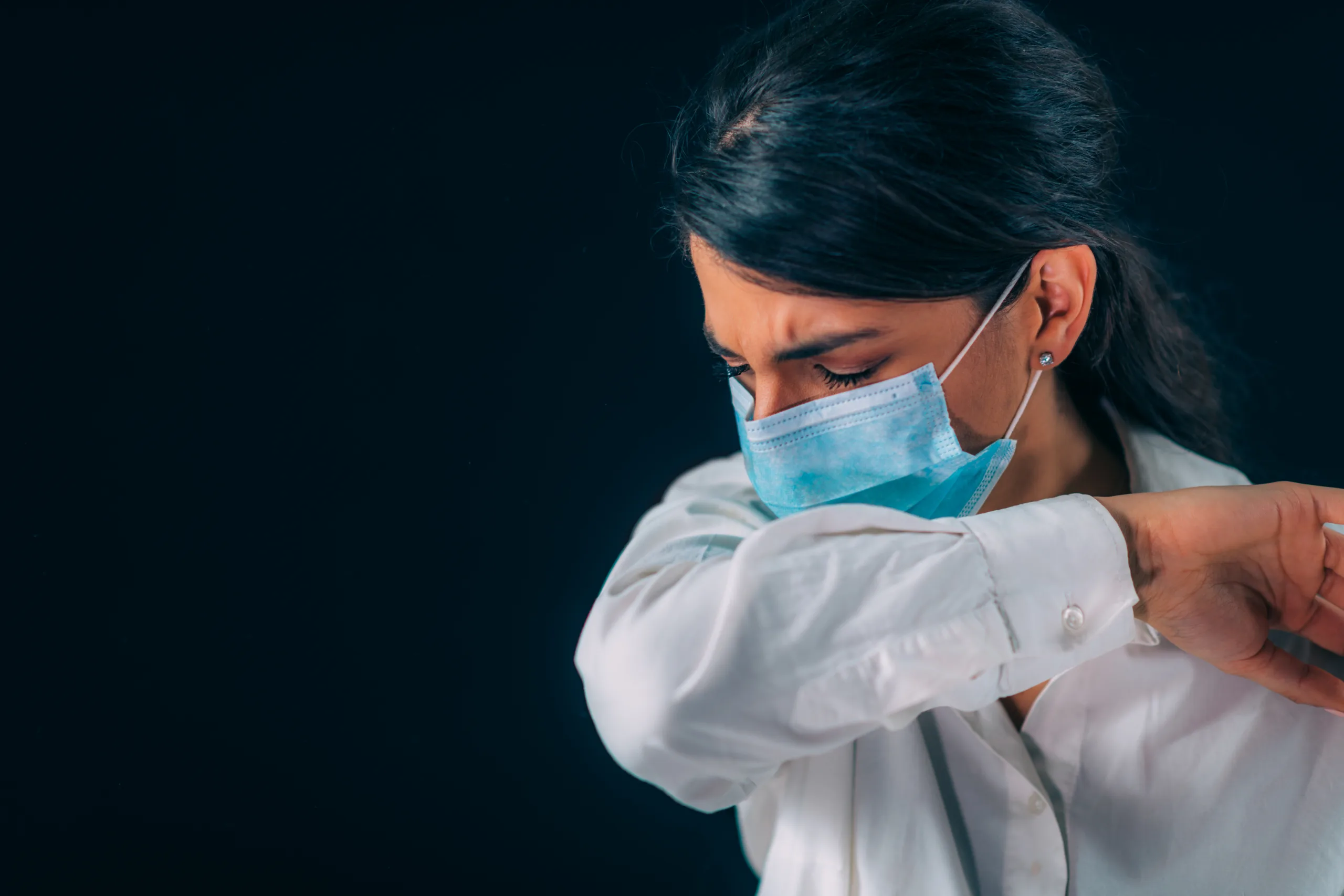 covid19 coronavirus prevention beautiful young woman coughing her elbow sleeve scaled