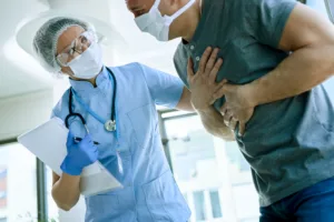 female doctor with patient who is complaining chest pain coronavirus epidemic