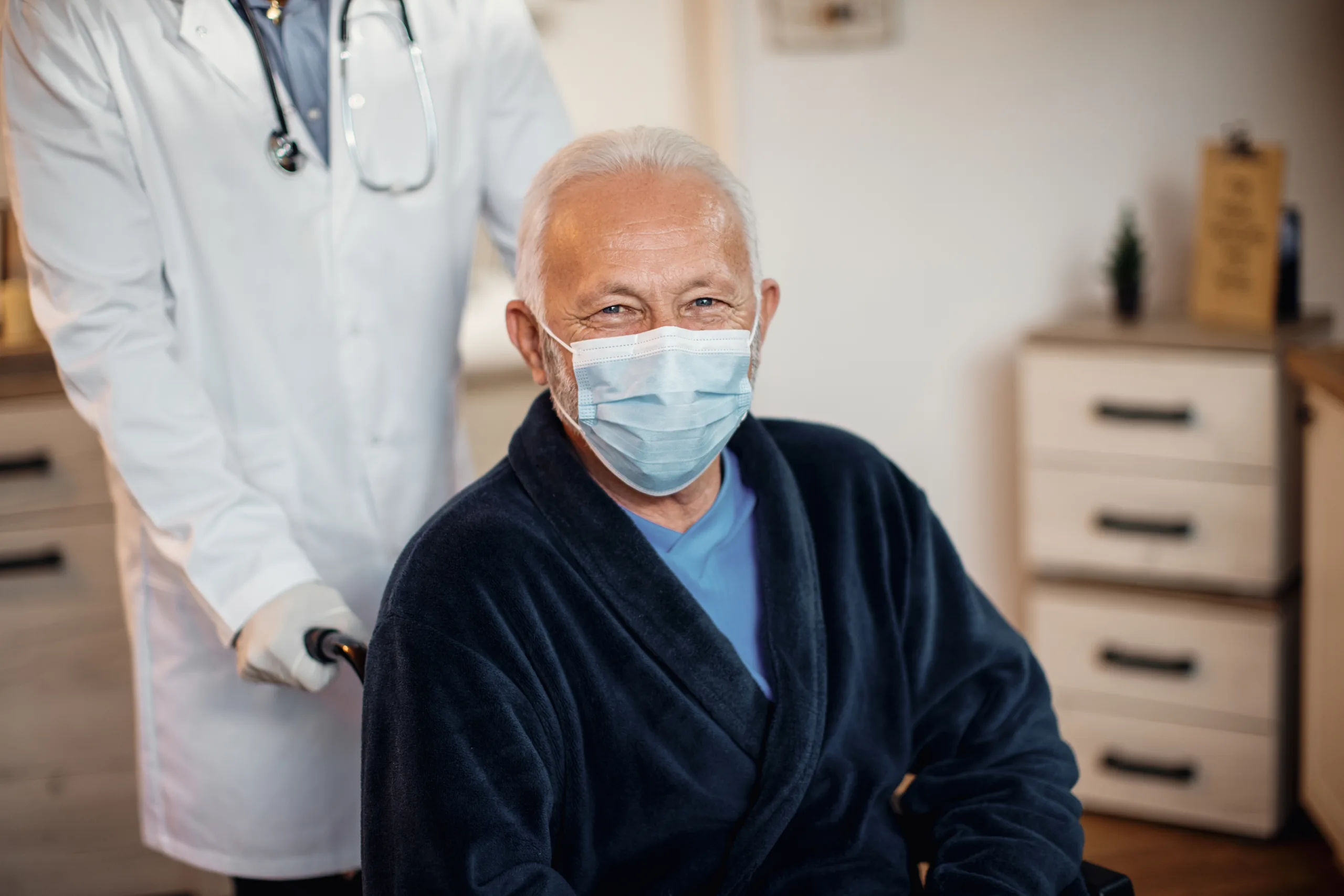 happy senior man wearing protective face mask nursing home looking camera scaled