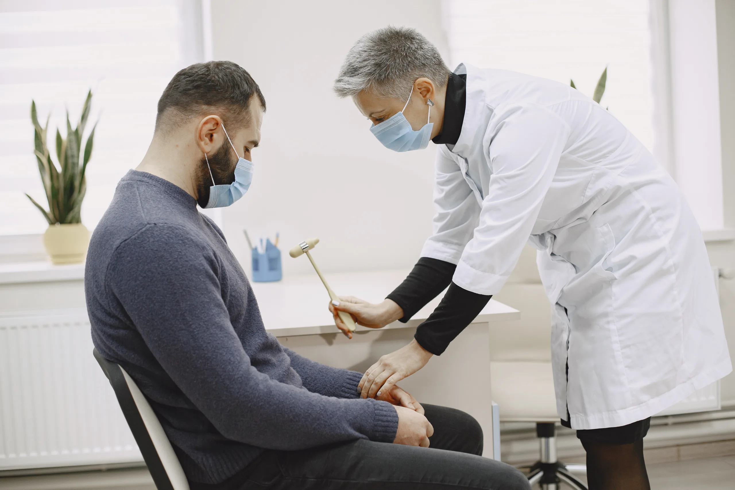 healthcare medical concept doctor with patient hospital man neurologist office scaled