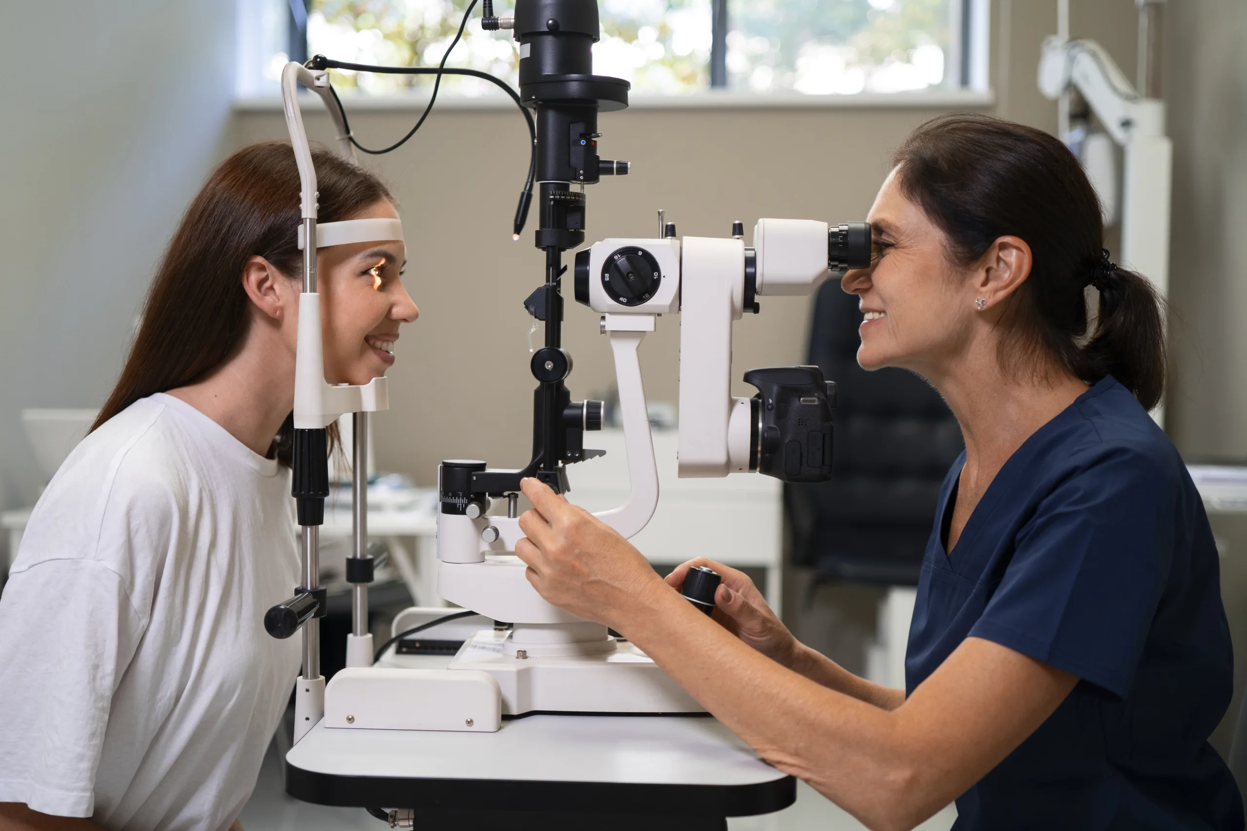 medium shot woman getting her eyes checked scaled