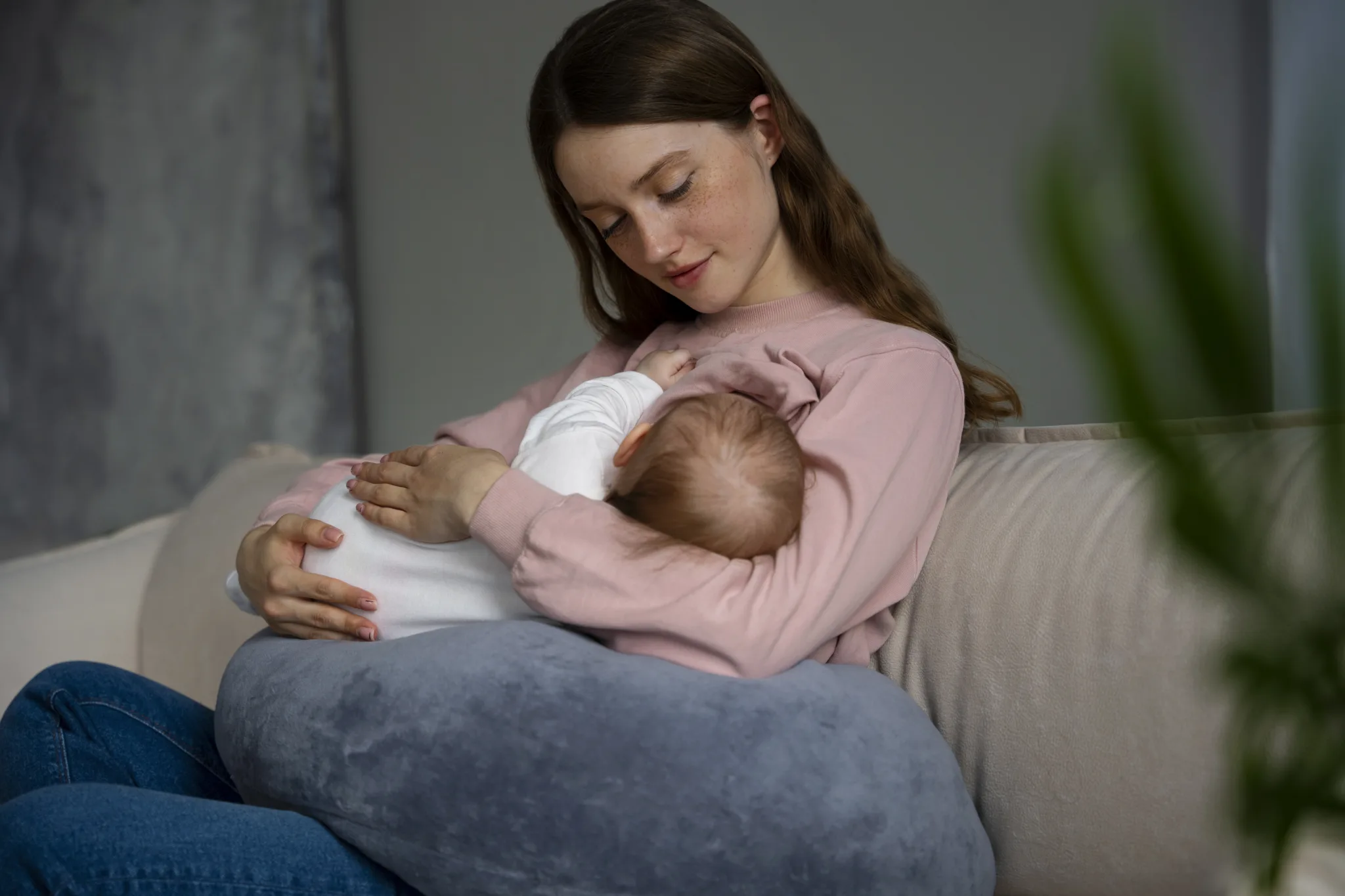 side view mother with cute newborn 1