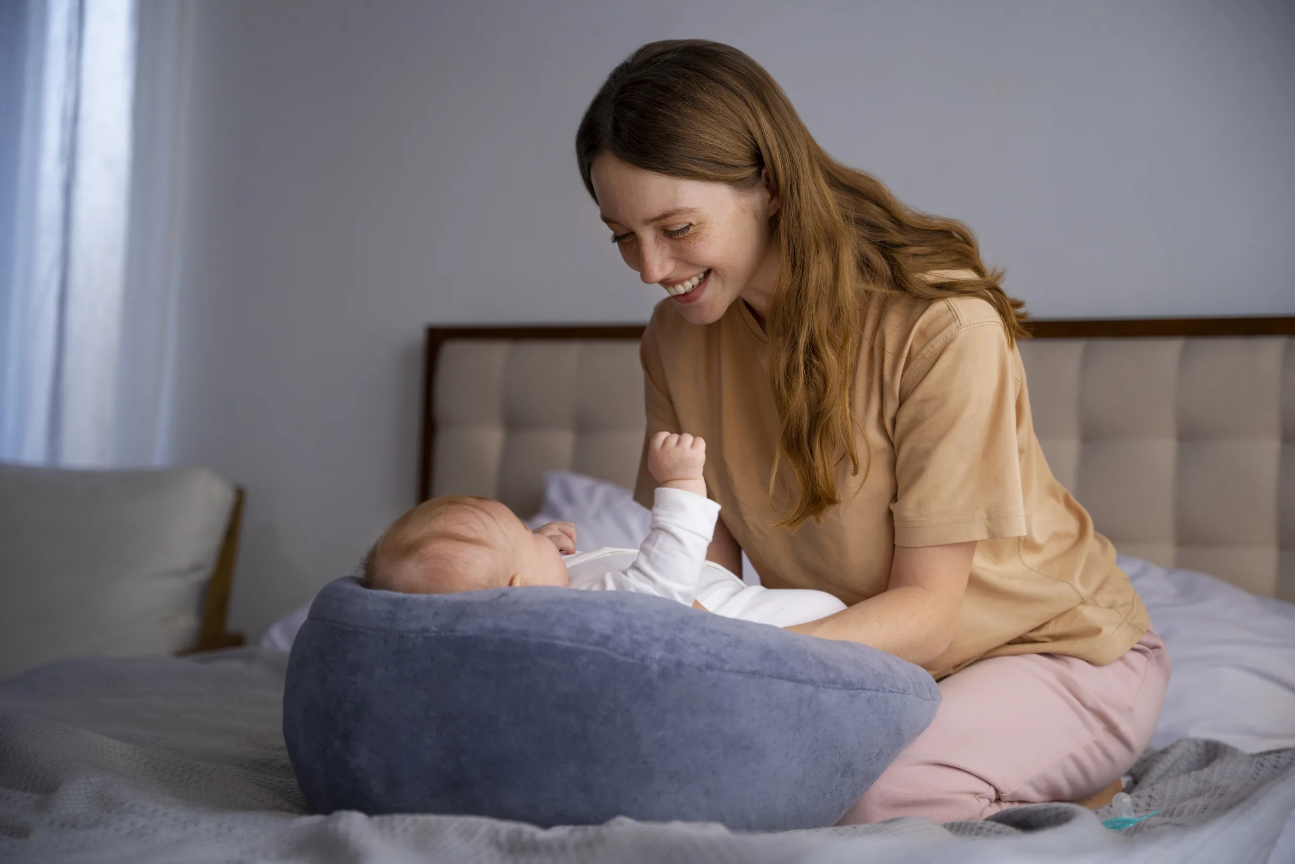 side view mother with cute newborn scaled