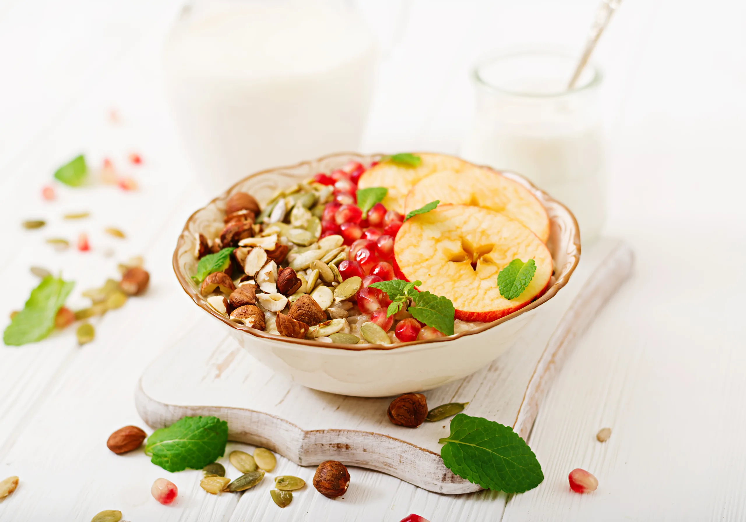 tasty healthy oatmeal porridge with apples pomegranate nuts healthy breakfast fitness food proper nutrition scaled